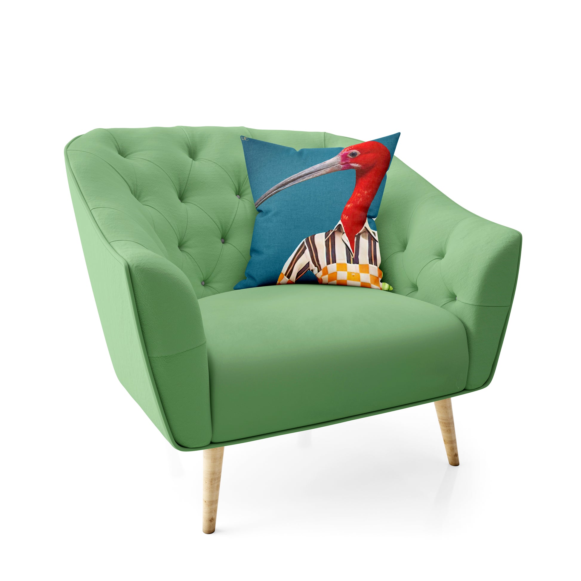  un coussin bien installé sur un fauteuil vert  avec une décoration originale 